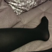 kristina kot - sexy girl in black pantyhose bow show feet