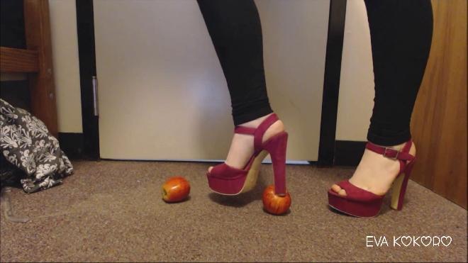 crushing apples in pink platform heels eva kokoro